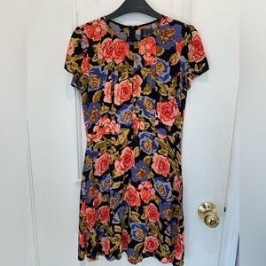 Reformation black floral mini dress. Size  XS